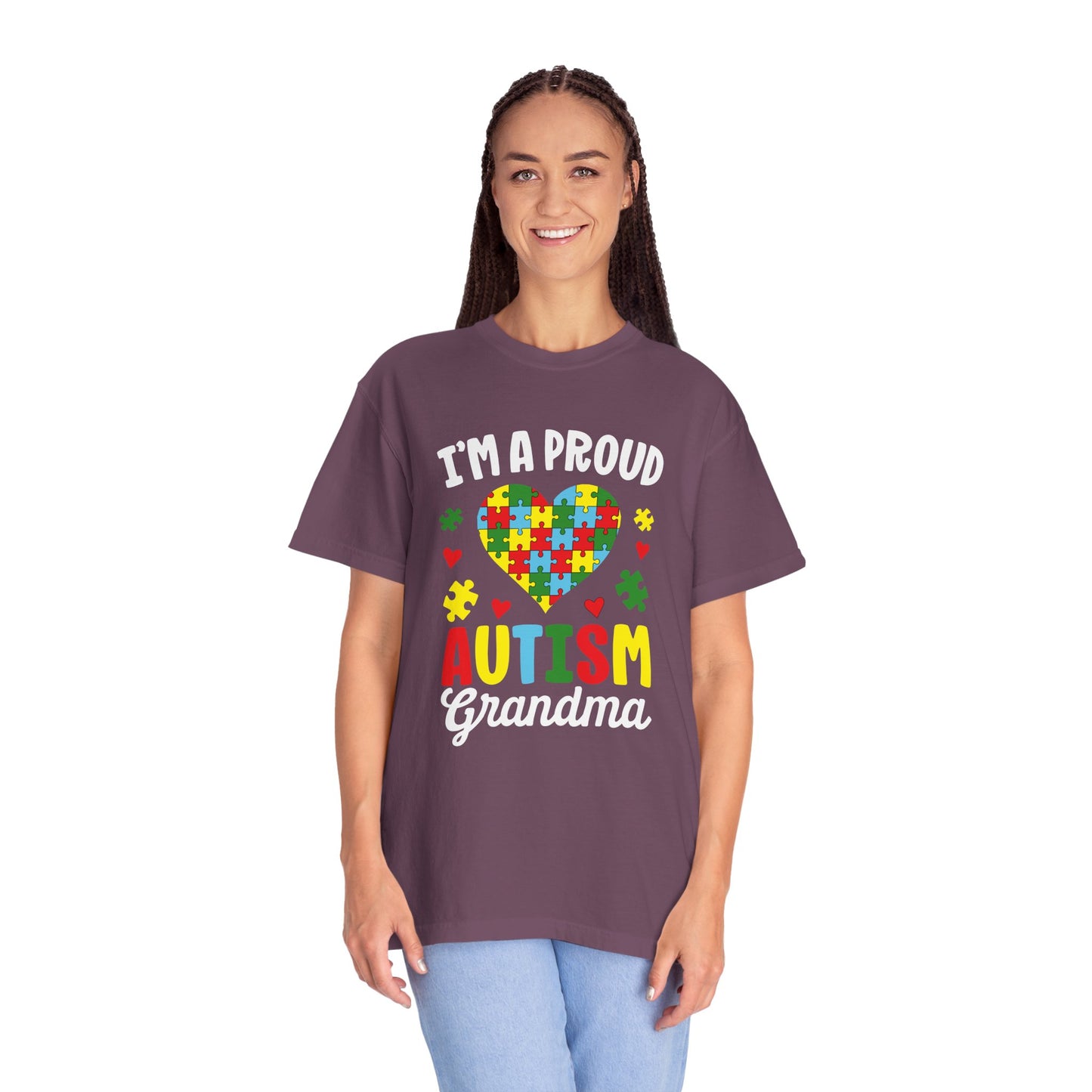 Berry t-shirt with text I am a proud Autism Grandma and graphic of colorful puzzle heart