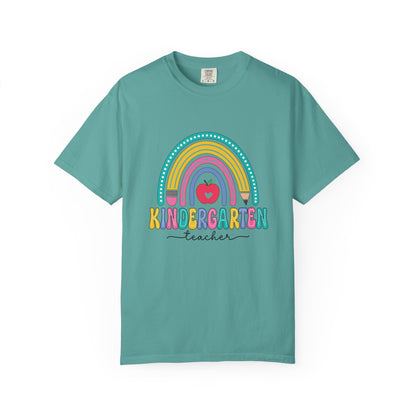 Seafoam t-shirt with rainbow, pencil and apple design, labeled 'Kindergarten teacher' ideal gift for teacher appreciation