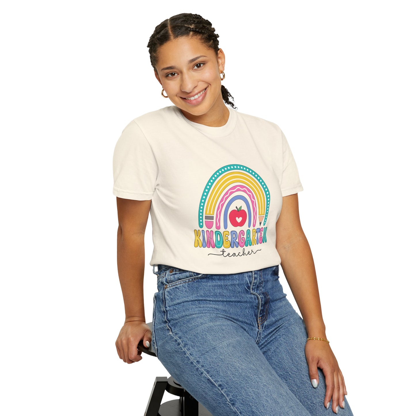 Ivory t-shirt with rainbow, pencil and apple design, labeled 'Kindergarten teacher' ideal gift for teacher appreciation