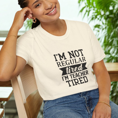 Natural t-shirt with black text 'I'm not regular tired, I'm teacher tired' teacher life