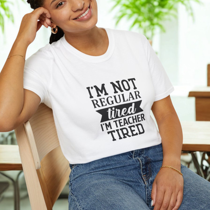 White t-shirt with black text 'I'm not regular tired, I'm teacher tired' teacher life