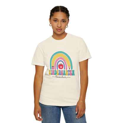 Ivory t-shirt with rainbow, pencil and apple design, labeled 'Kindergarten teacher' ideal gift for teacher appreciation