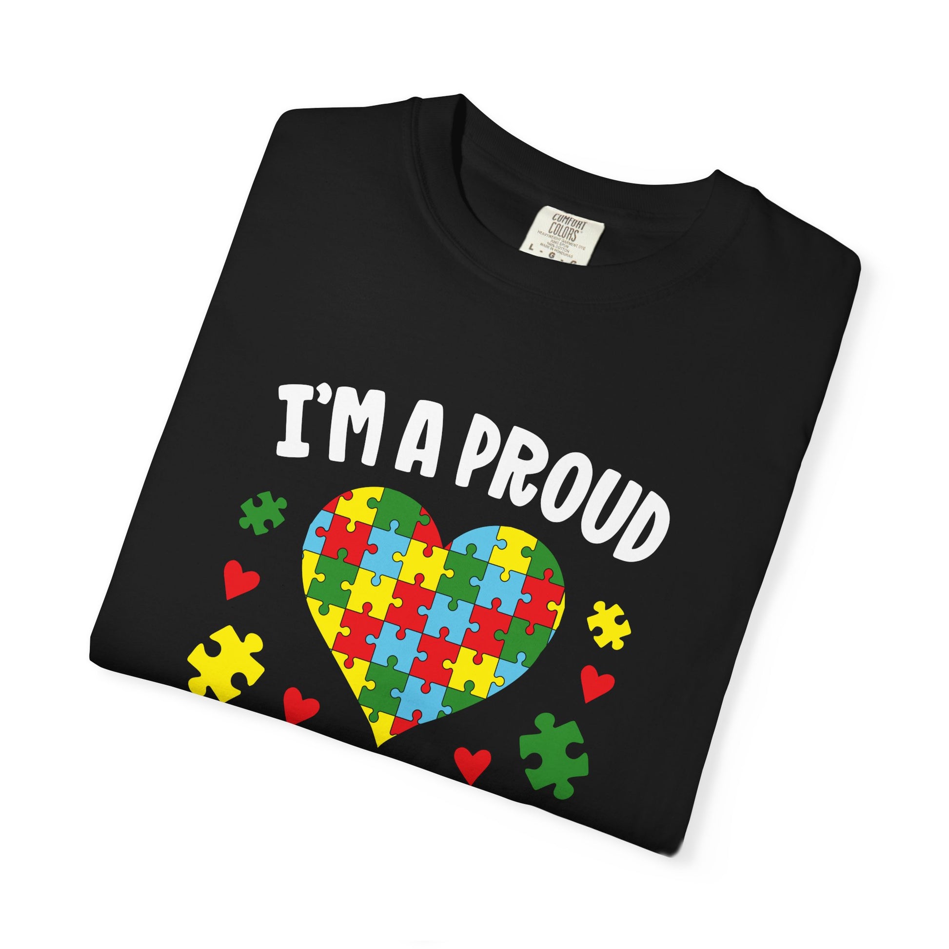 Black t-shirt with text I am a proud Autism Grandma and graphic of colorful puzzle heart