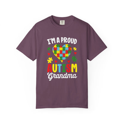 Berry t-shirt with text I am a proud Autism Grandma and graphic of colorful puzzle heart