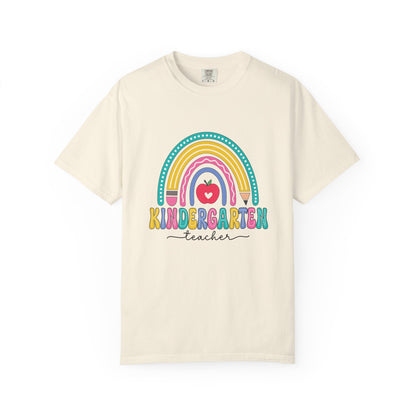 Ivory t-shirt with rainbow, pencil and apple design, labeled 'Kindergarten teacher' ideal gift for teacher appreciation