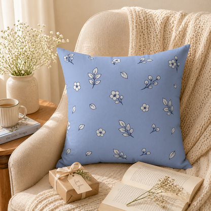 Close-up of blue floral pillow with concealed zipper and textured fabric, decorative cushion detail