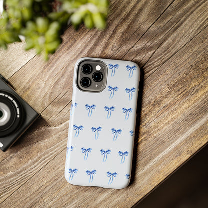 iPhone 11 Pro case with girly romantic watercolor blue bow pattern on a light blue background