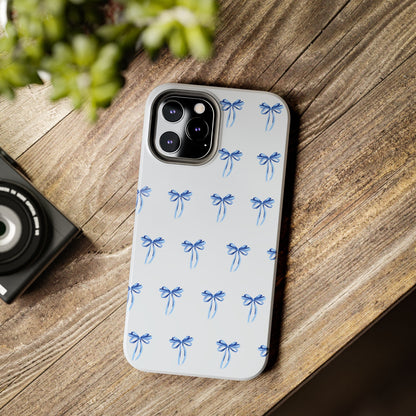 iPhone 12 Pro Max case with girly romantic watercolor blue bow pattern on a light blue background