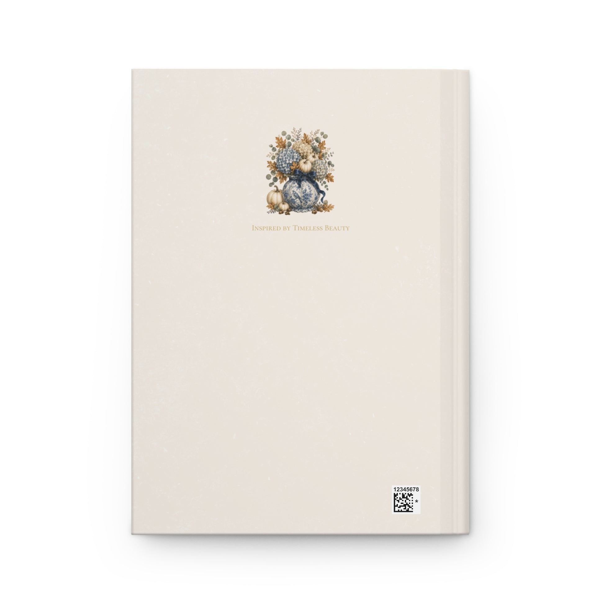 Back cover of the Autumn Reflections hardcover journal with a minimalist cream design and small vintage floral pumpkin illustration.