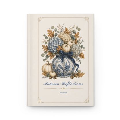 Autumn Reflections hardcover journal featuring a vintage floral bouquet in a porcelain vase with ivory pumpkins on an elegant cream cover.