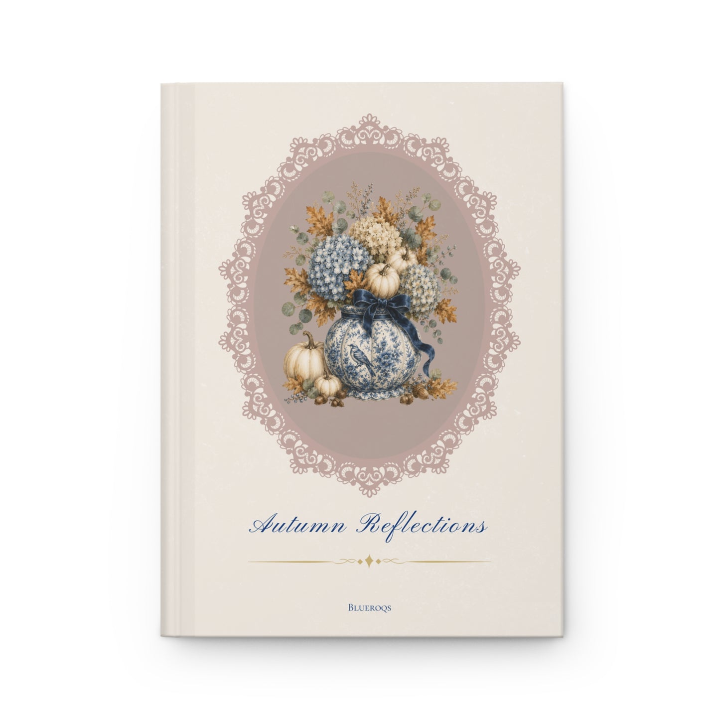 Autumn Reflections hardcover journal featuring a vintage floral arrangement of blue hydrangeas, porcelain-inspired vase, pumpkins and an elegant heirloom cameo frame on a cream cover.