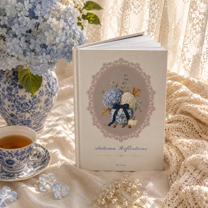 Standing Autumn Reflections Hydrangea hardcover journal featuring a vintage hydrangea bouquet in a porcelain vase styled with blue hydrangeas and soft linen.