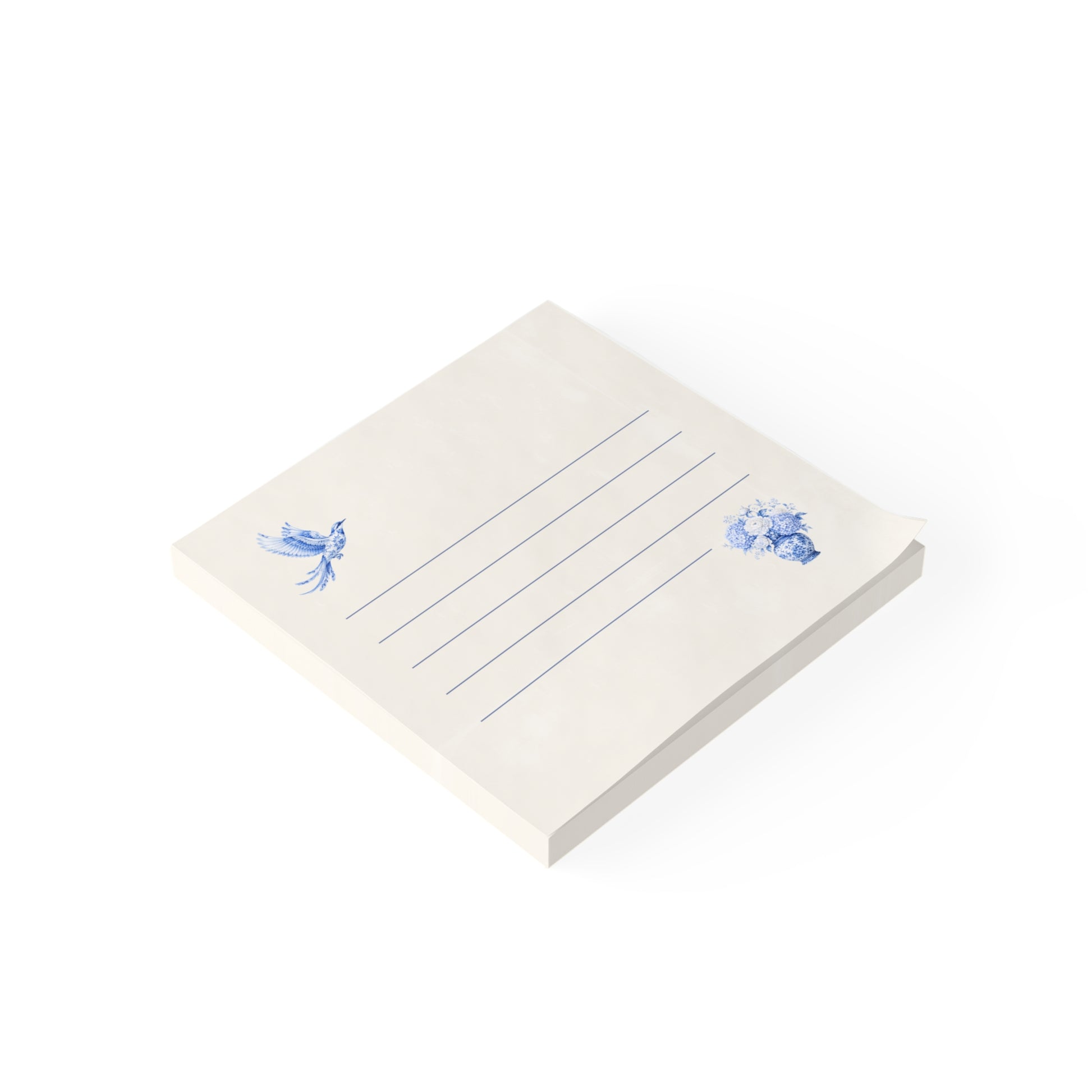 Blue bird and floral sticky note pad shown in angled view with lined writing space and ivory stationery design