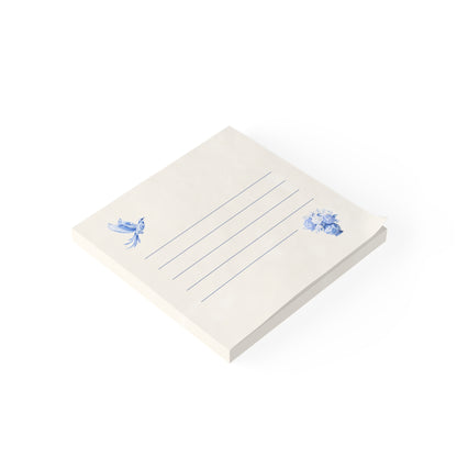 Blue bird and floral sticky note pad shown in angled view with lined writing space and ivory stationery design