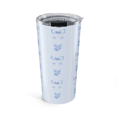 20 oz Blue bow and hydrangea tumbler featuring a delicate floral ribbon pattern on an insulated travel mug