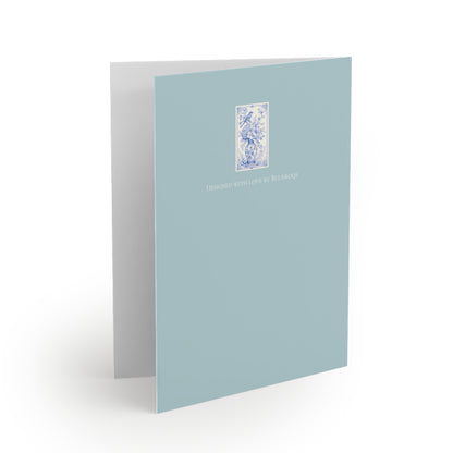 Back of blue chinoiserie greeting card with coordinating vintage floral artwork on a soft sea-glass blue background.