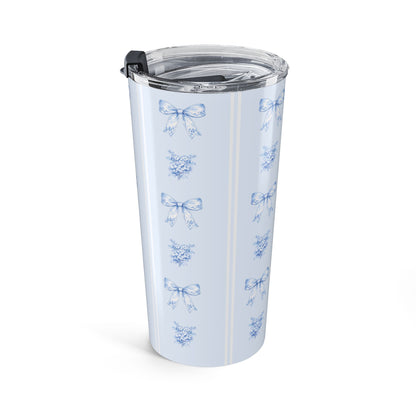 20  oz blue ribbon bow tumbler shown from an angled side view with hydrangea floral pattern and powder blue background