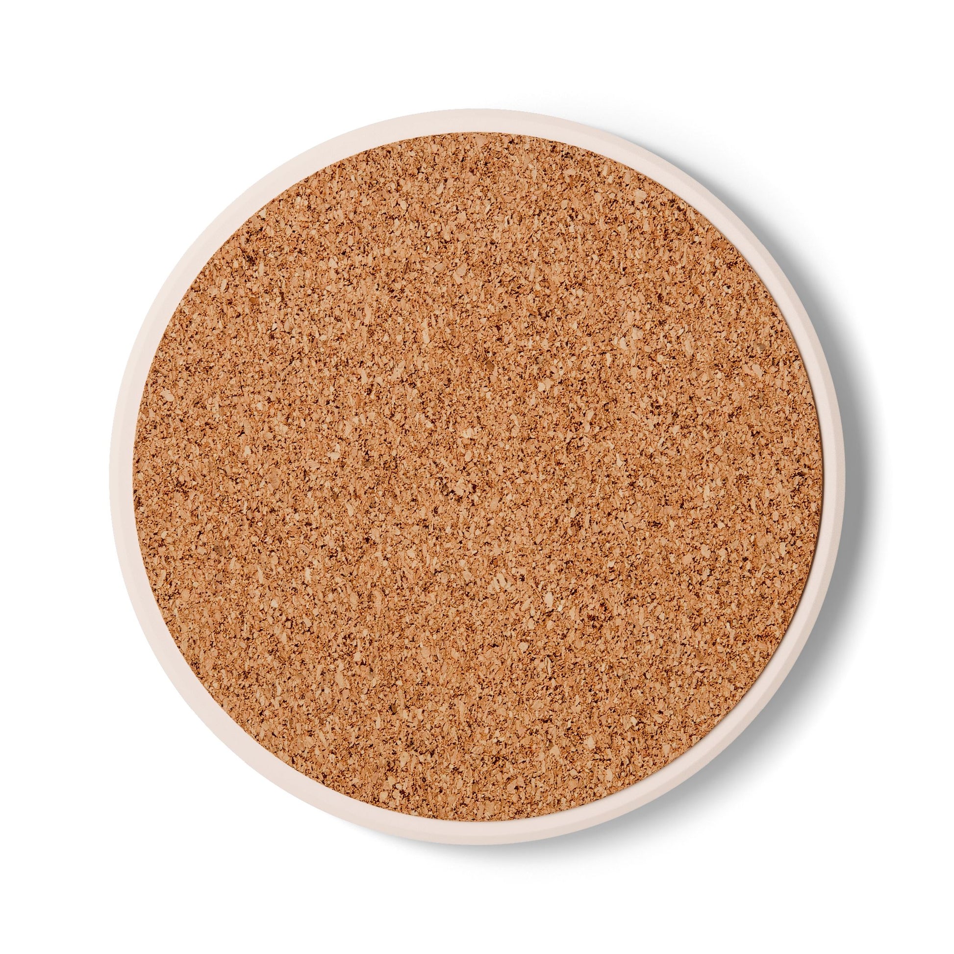 Cork backing of the blue floral ceramic coaster designed to protect furniture and prevent slipping.