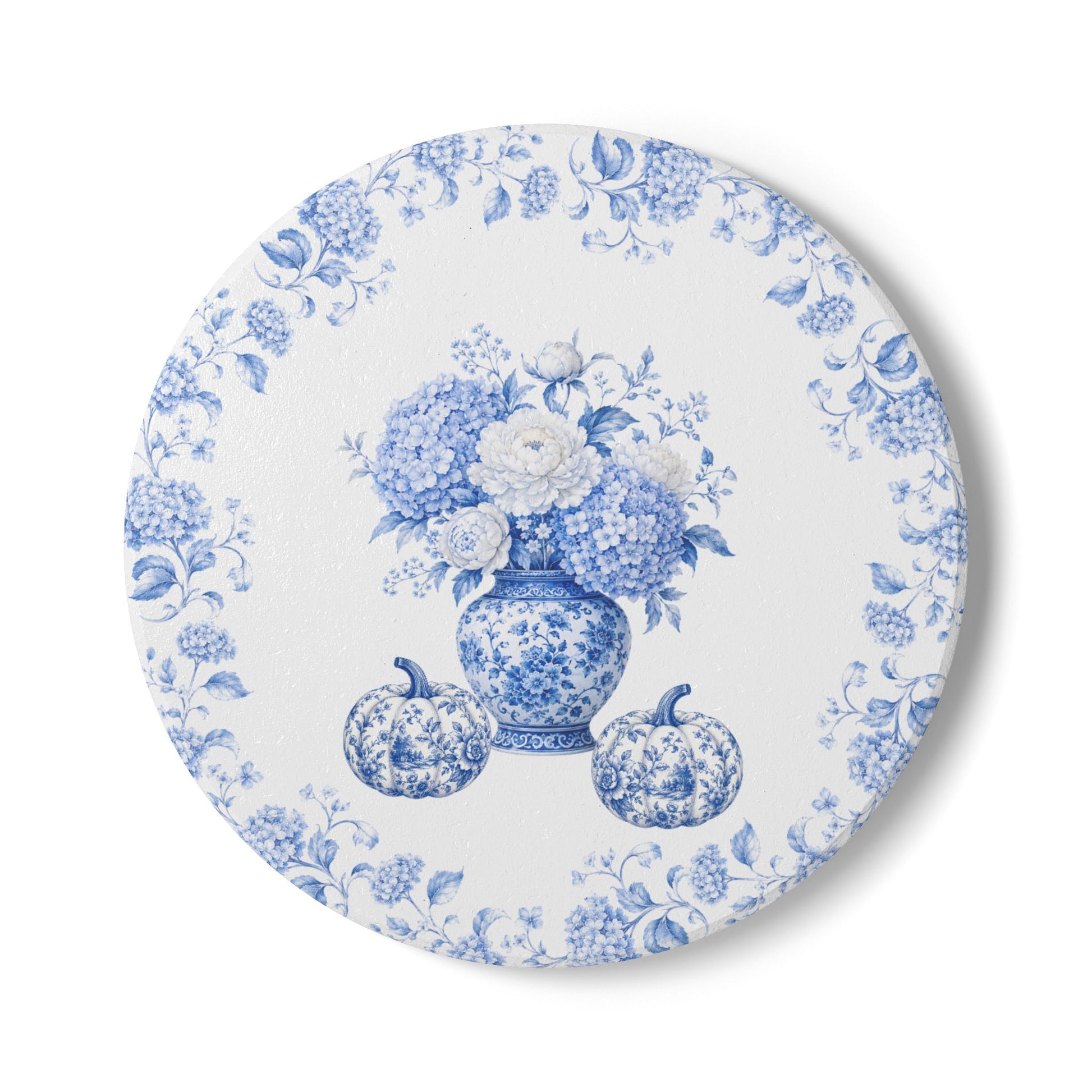 Blue floral ceramic coaster featuring a vintage blue and white porcelain vase with hydrangeas and pumpkins.