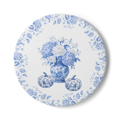 Blue floral ceramic coaster featuring a vintage blue and white porcelain vase with hydrangeas and pumpkins.