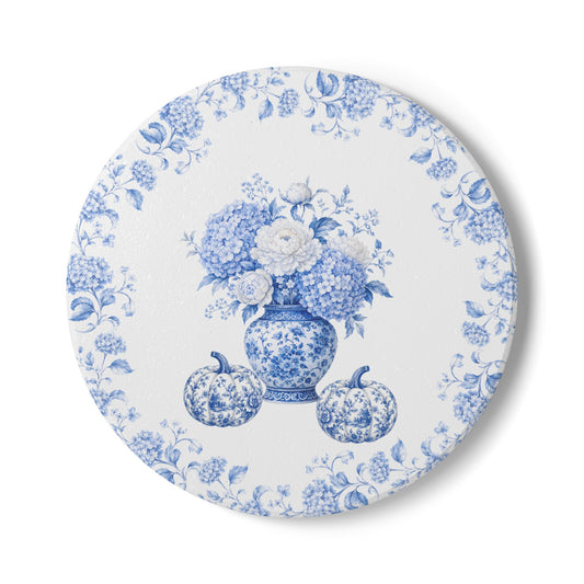 Blue floral ceramic coaster featuring a vintage blue and white porcelain vase with hydrangeas and pumpkins.