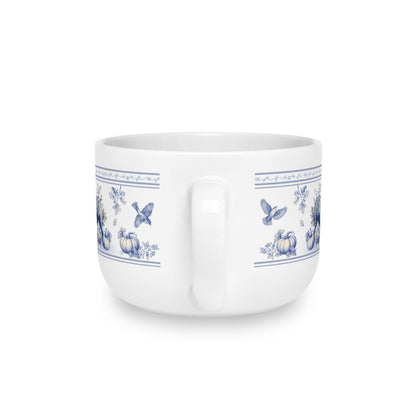 Back view of a 25oz vintage blue transferware ceramic latte mug featuring porcelain vase, pumpkins, hydrangeas and flying birds.
