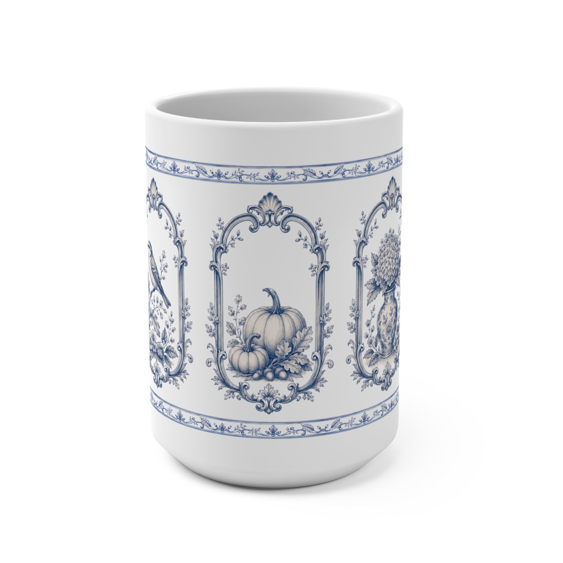Blue transferware 15oz ceramic mug featuring vintage pumpkin, bird and botanical panels inspired by antique English pottery.