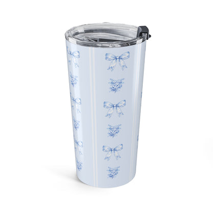 20 oz blue hydrangea and bow travel mug featuring an elegant repeating floral and ribbon wraparound design