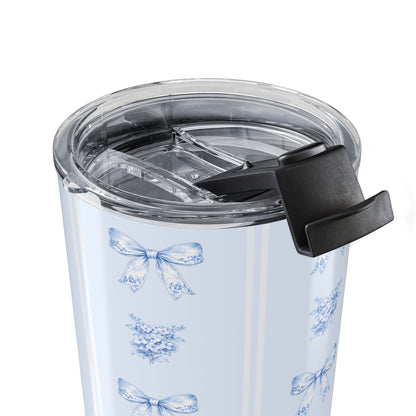 20 oz close-up of the clear push-on lid on a blue bow and hydrangea insulated travel tumbler