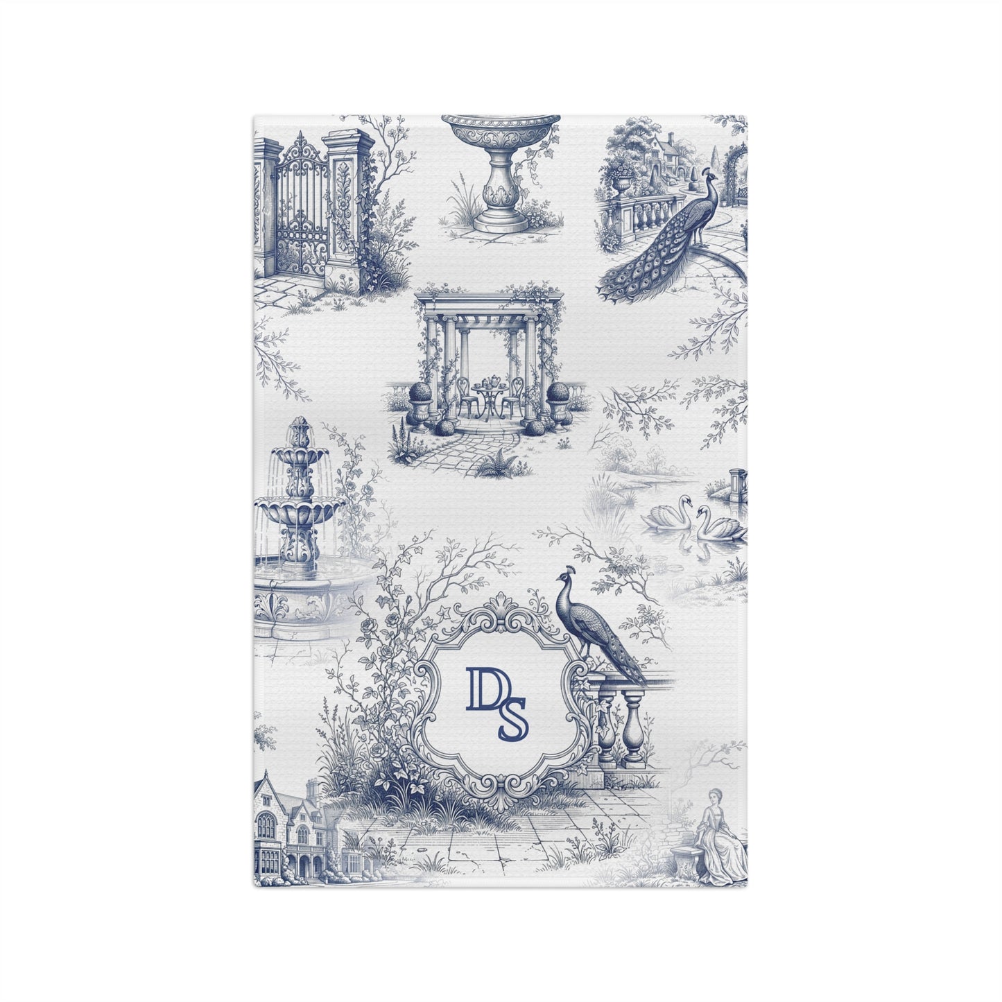 Front view of a personalized blue toile tea towel with estate garden scenes, peacocks, swans, and a custom monogram frame.