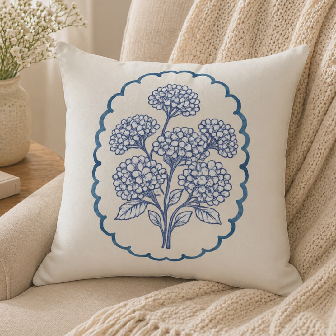 Video showing blue hydrangea floral throw pillow from multiple angles, highlighting texture, double-sided botanical design, and soft decorative cushion styling