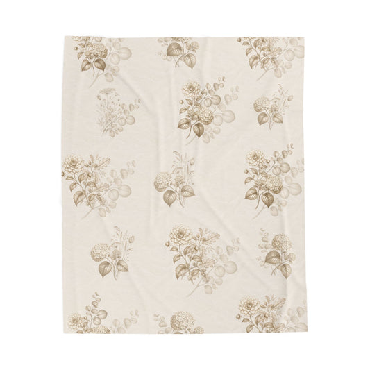Vintage beige floral velveteen plush blanket with a soft botanical pattern in warm neutral tones.