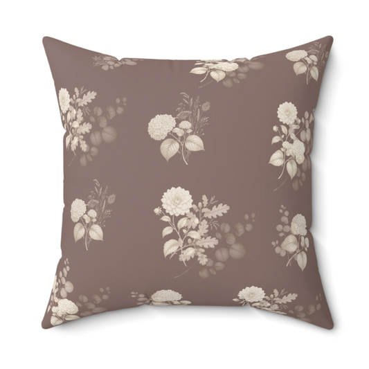 Vintage floral brown throw pillow with cream botanical bouquet pattern on a warm taupe background.