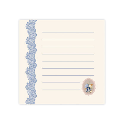 Vintage floral sticky note pad with blue lace border, lined memo pages, and a delicate autumn bouquet illustration on a soft ivory background.
